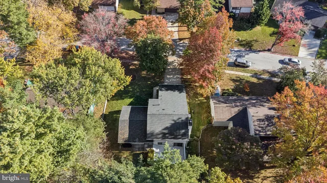 an aerial view of residential house with outdoor space