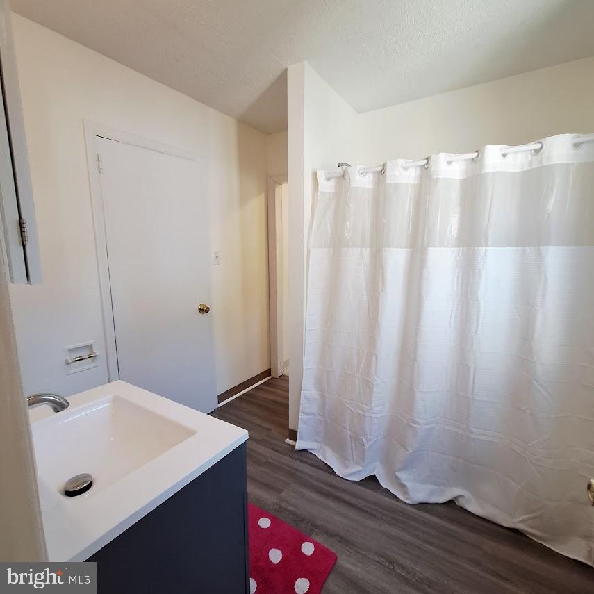226 Appleby Road New Castle, DE 19720 - Photo 20 of 34 a bathroom with a sink and a mirror