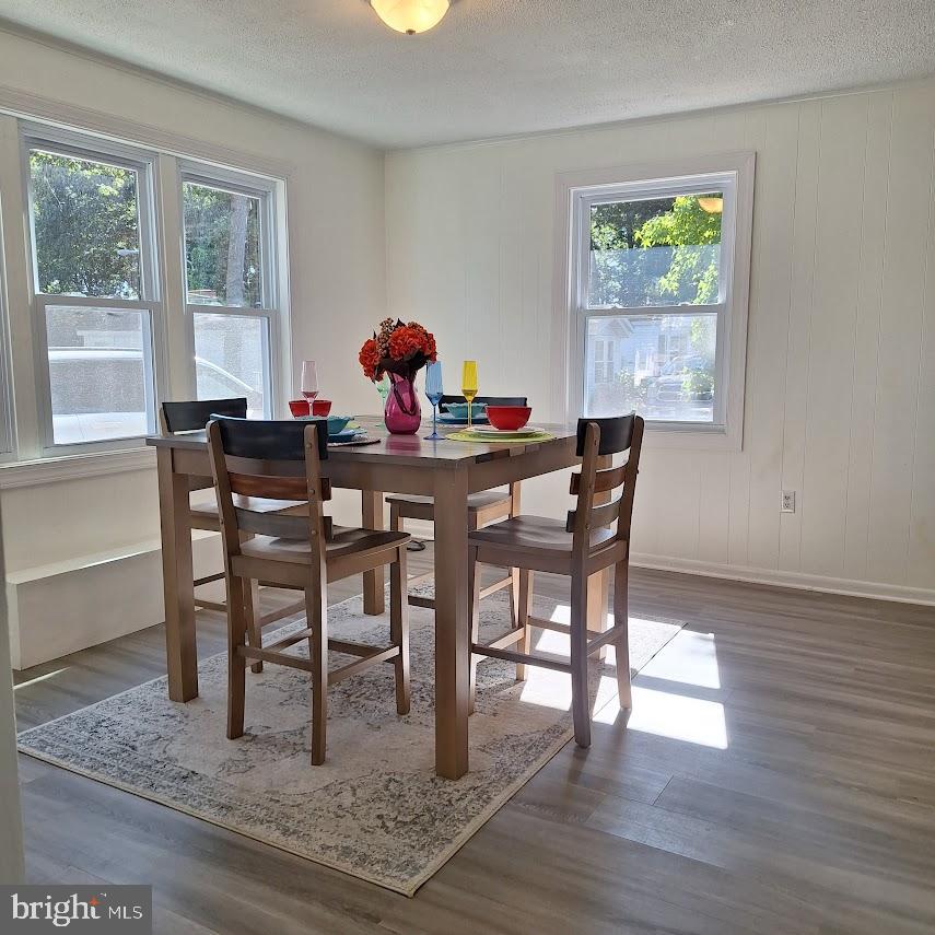 226 Appleby Road New Castle, DE 19720 - Photo 4 of 34 a dining room with furniture and wooden floor