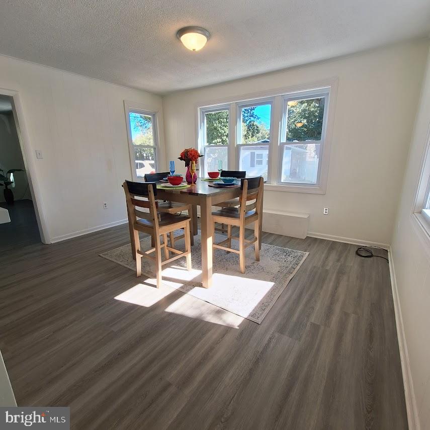 226 Appleby Road New Castle, DE 19720 - Photo 6 of 34 a view of a dining room with furniture and a window
