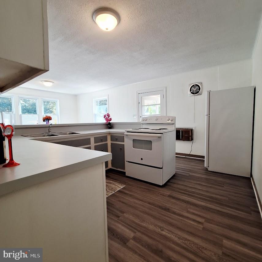 226 Appleby Road New Castle, DE 19720 - Photo 8 of 34 a kitchen with stainless steel appliances a sink and a refrigerator