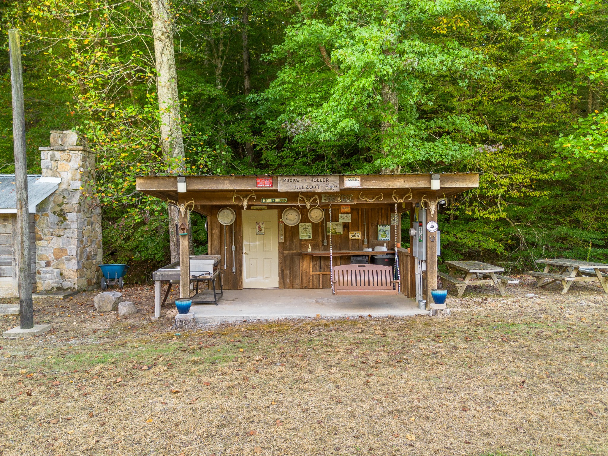 0 Puckett Hollow Road Centerville, TN 37033 - Photo 20 of 53 a view of a patio with a table and chairs under an umbrella