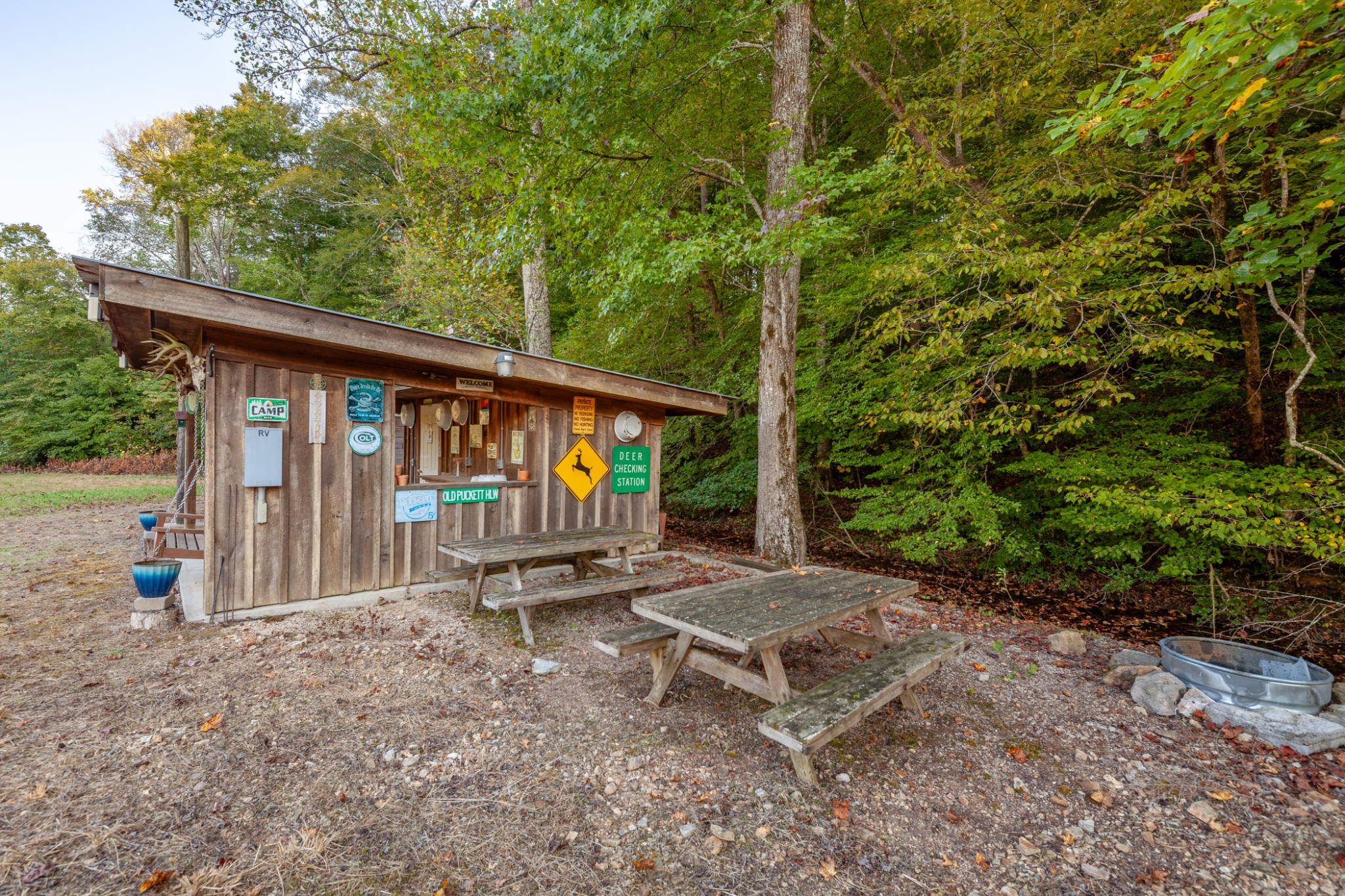 0 Puckett Hollow Road Centerville, TN 37033 - Photo 21 of 53 a backyard of a house with table and chairs