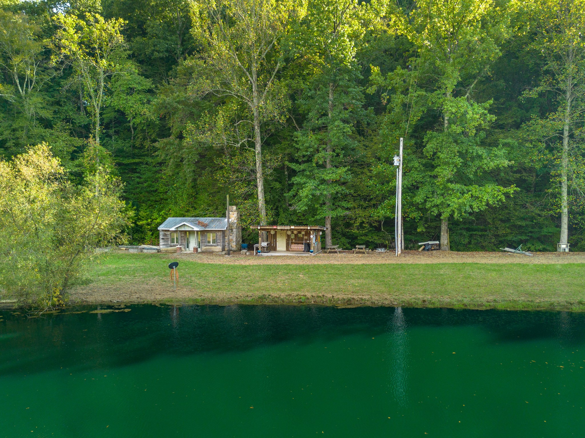 0 Puckett Hollow Road Centerville, TN 37033 - Photo 38 of 53 a front view of a house with a yard table and chairs