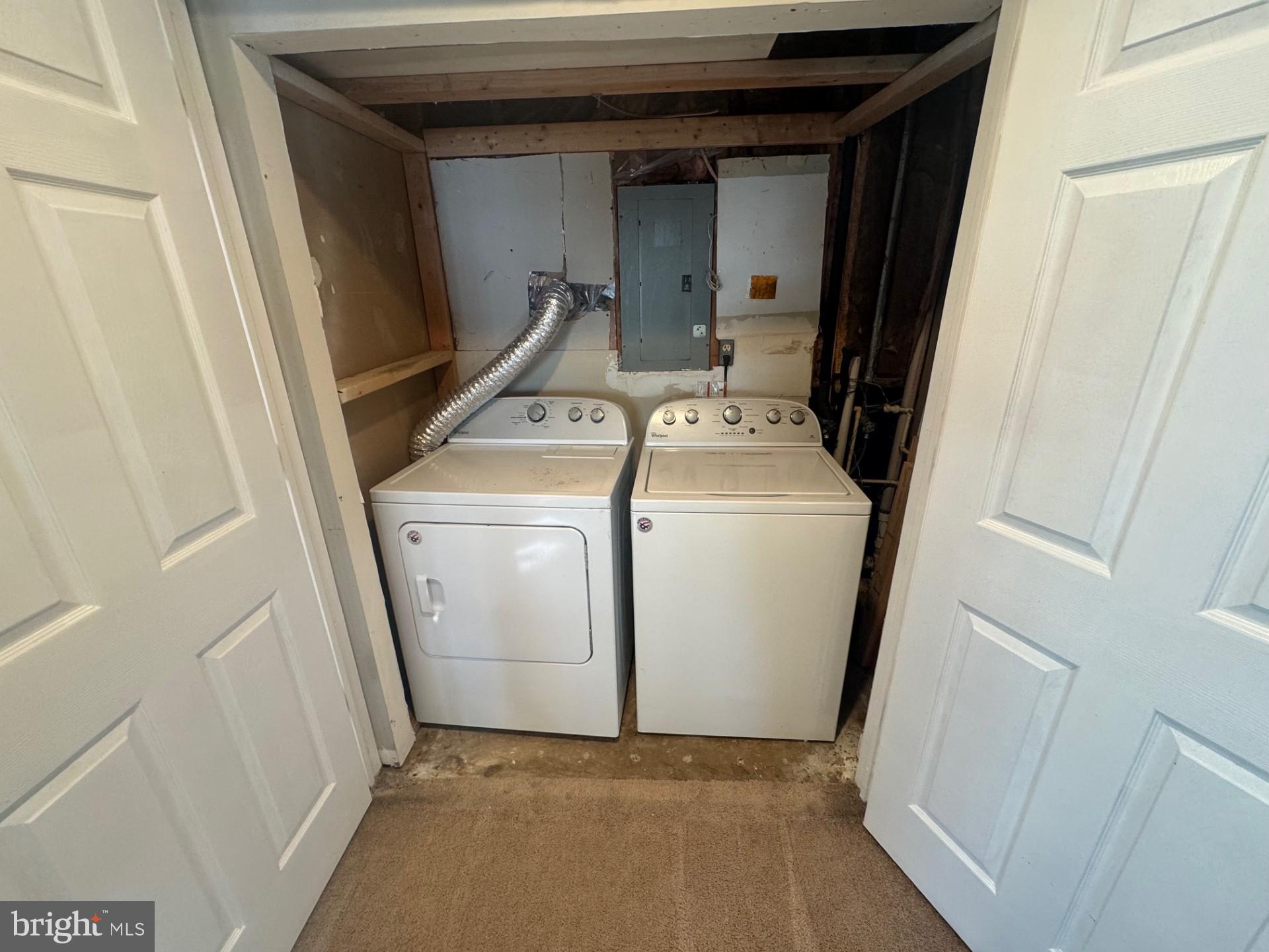 8587 Tyrolean Way Springfield, VA 22153 - Photo 17 of 19 a utility room with dryer and washer