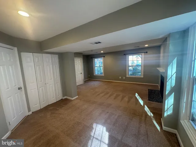 a view of livingroom with furniture and windows