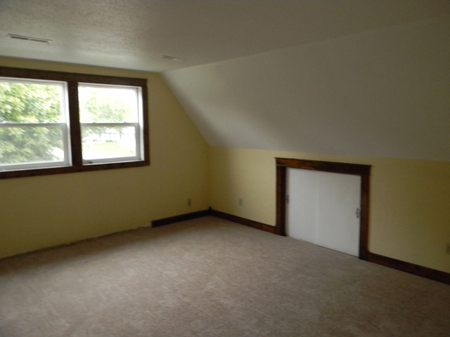1048 Calvin Road Rochelle, IL 61068 - Photo 14 of 17 an empty room with a window