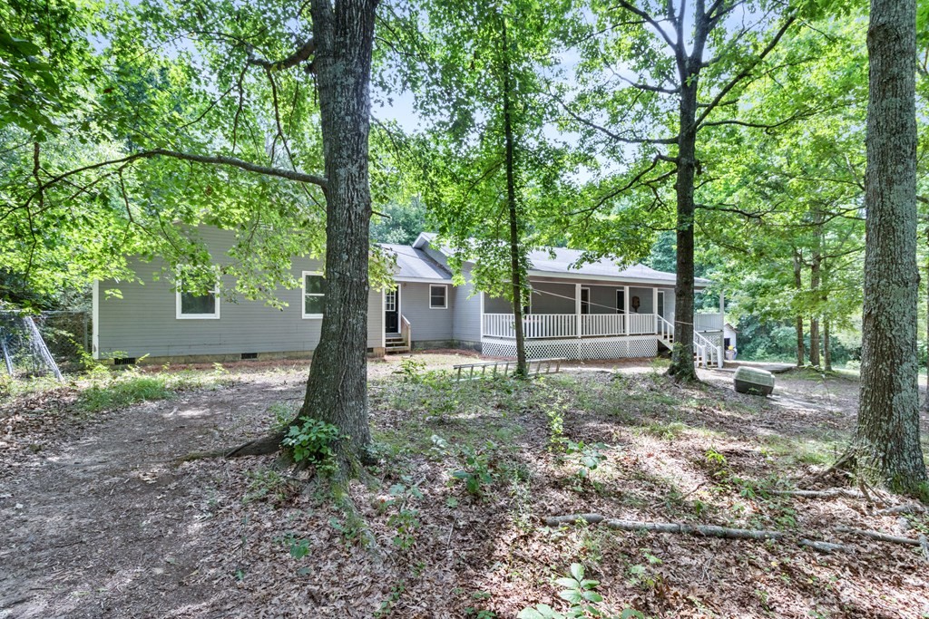 750 Robinson Road Chatsworth, GA 30705 - Photo 34 of 39 a view of a house with yard and a tree