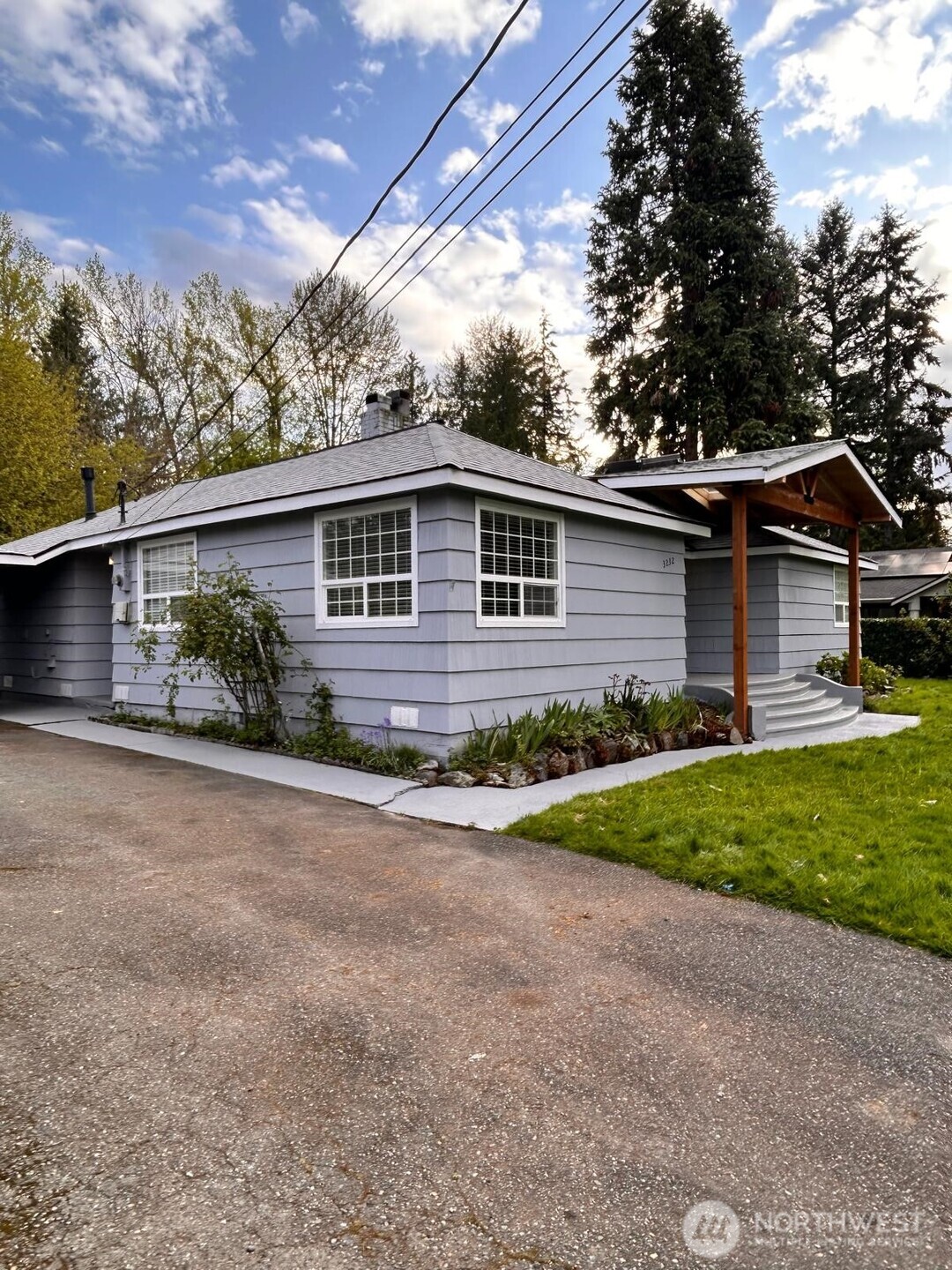3232 Russet Road Brier, WA 98036 - Photo 3 of 11 a front view of a house with garden