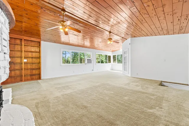 a view of a backyard of the house