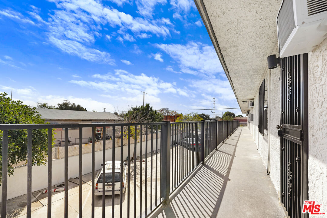 10028 San Fernando Road Pacoima, CA 91331 - Photo 11 of 16 a view of balcony with staircase