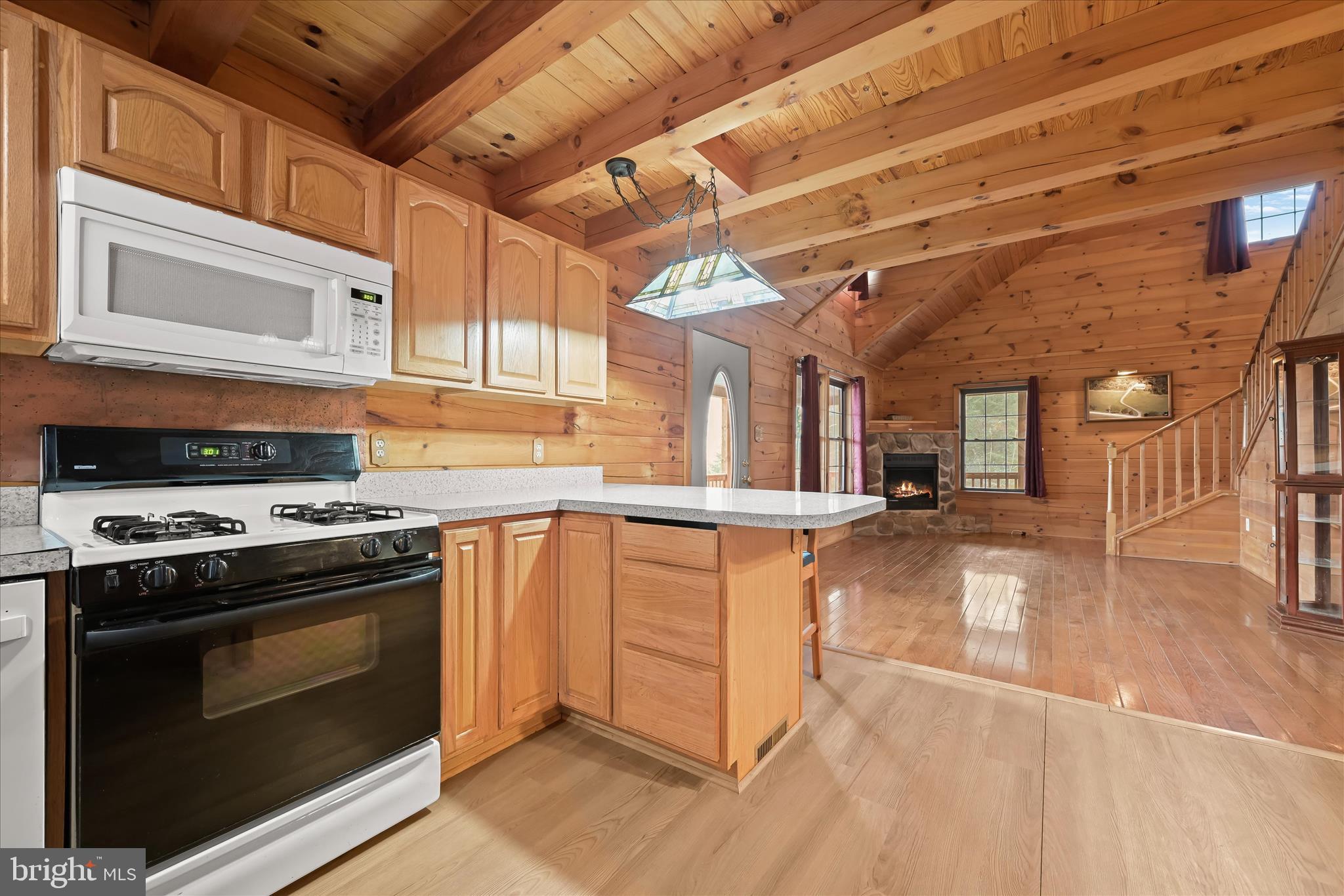 3580 Flickinger Road Westminster, MD 21158 - Photo 15 of 81 a kitchen with stainless steel appliances granite countertop a stove a sink and a refrigerator