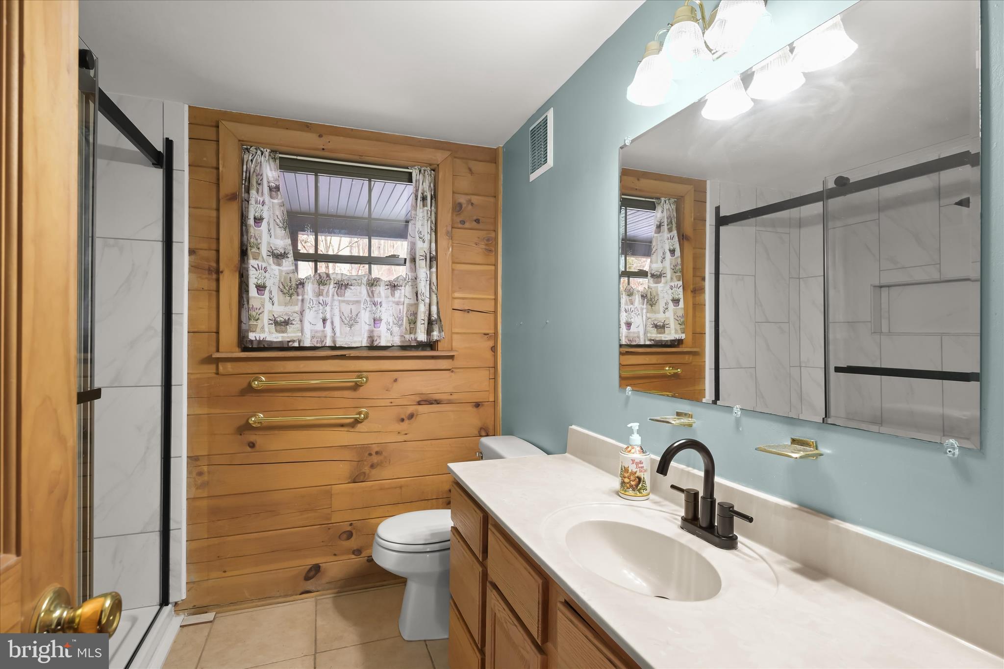 3580 Flickinger Road Westminster, MD 21158 - Photo 27 of 81 a bathroom with a sink toilet and shower