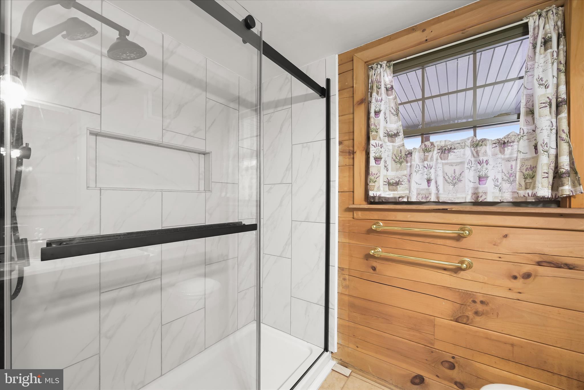 3580 Flickinger Road Westminster, MD 21158 - Photo 28 of 81 a bathroom with a shower and a window