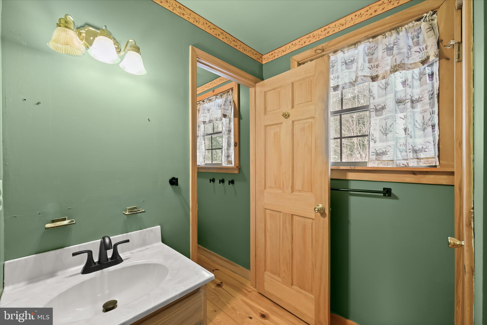 3580 Flickinger Road Westminster, MD 21158 - Photo 34 of 81 a bathroom with a sink and a mirror