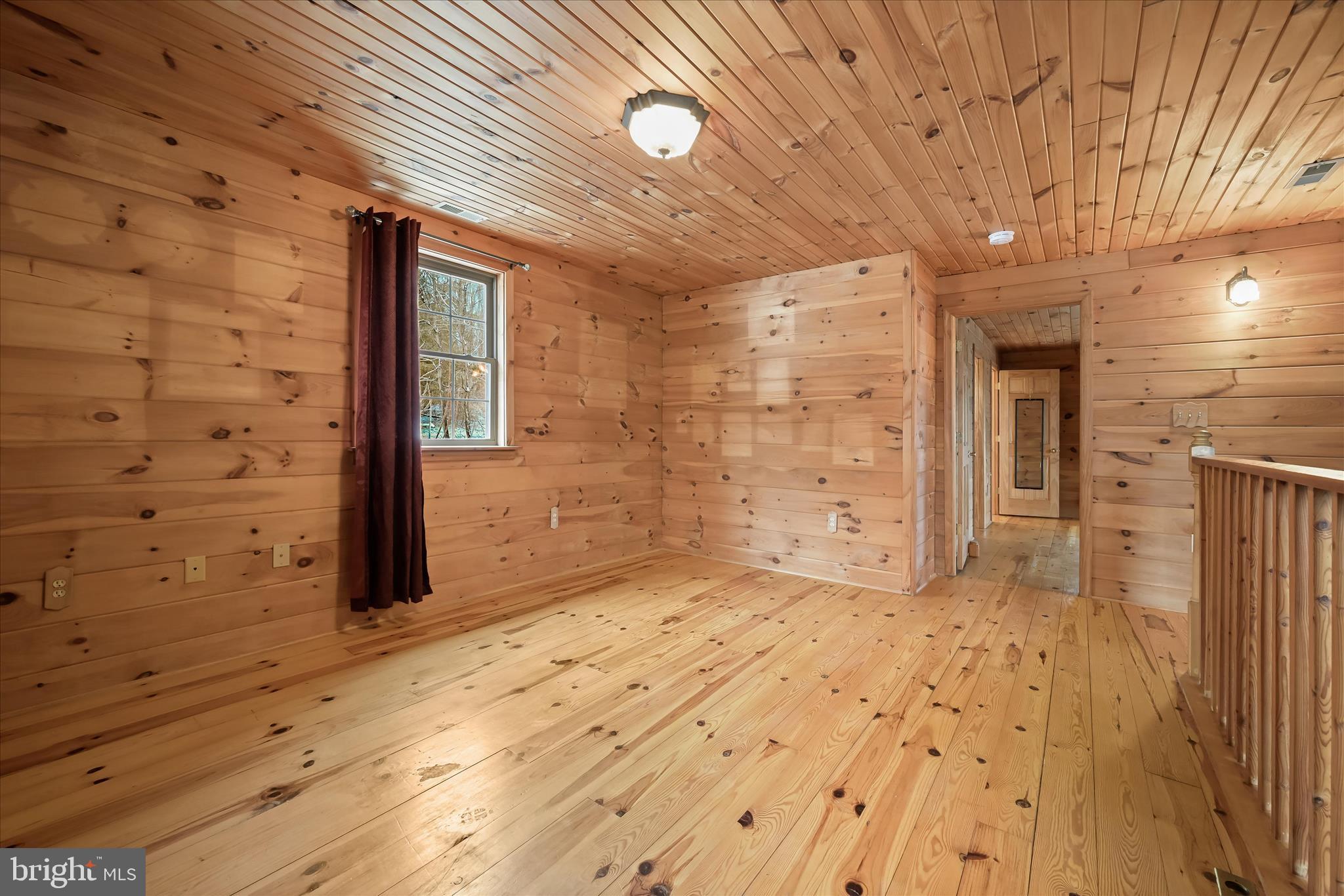 3580 Flickinger Road Westminster, MD 21158 - Photo 39 of 81 a view of empty room with wooden floor
