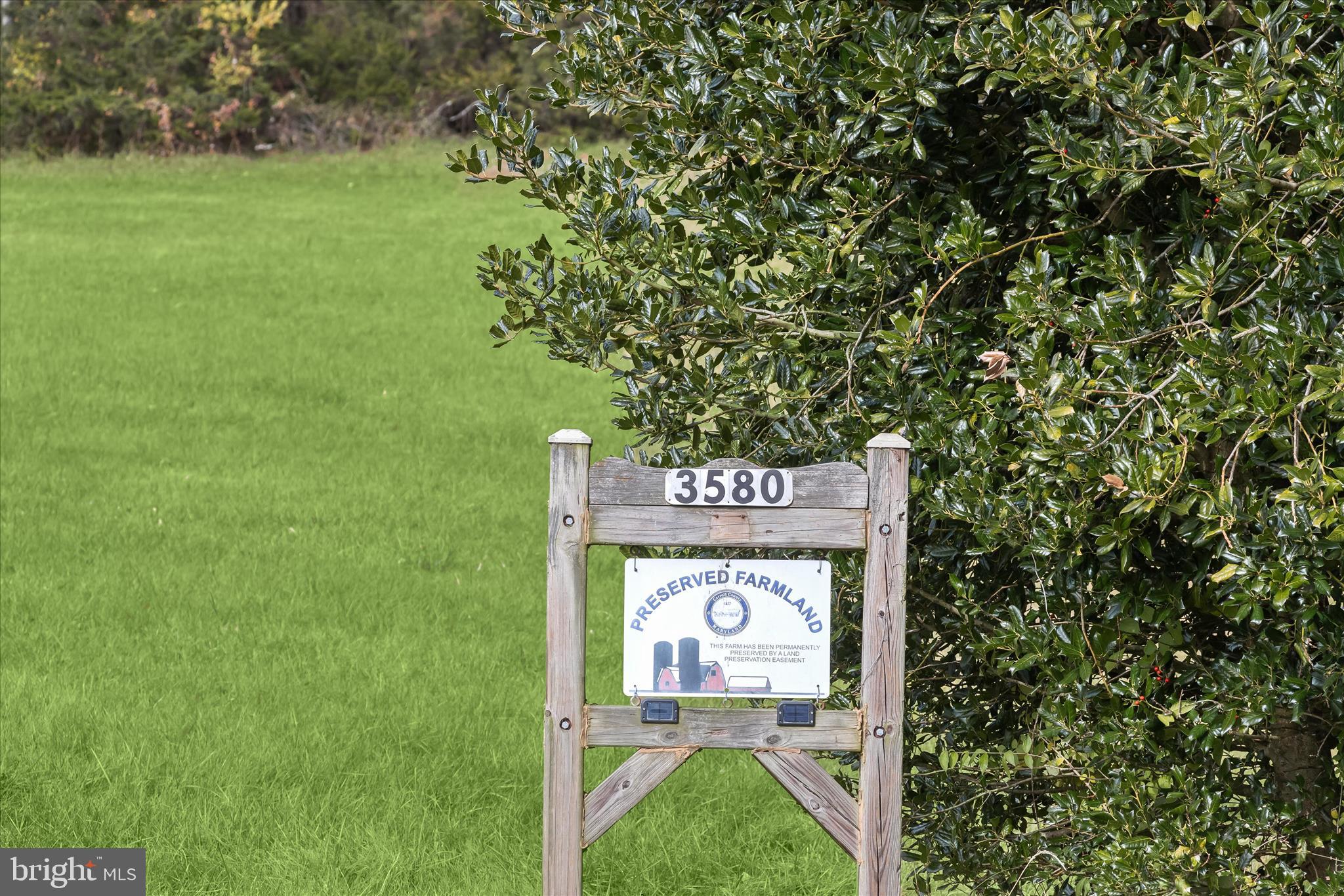 3580 Flickinger Road Westminster, MD 21158 - Photo 67 of 81 a sign that is sitting on a lush green field
