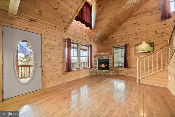 a view of entryway with wooden floor