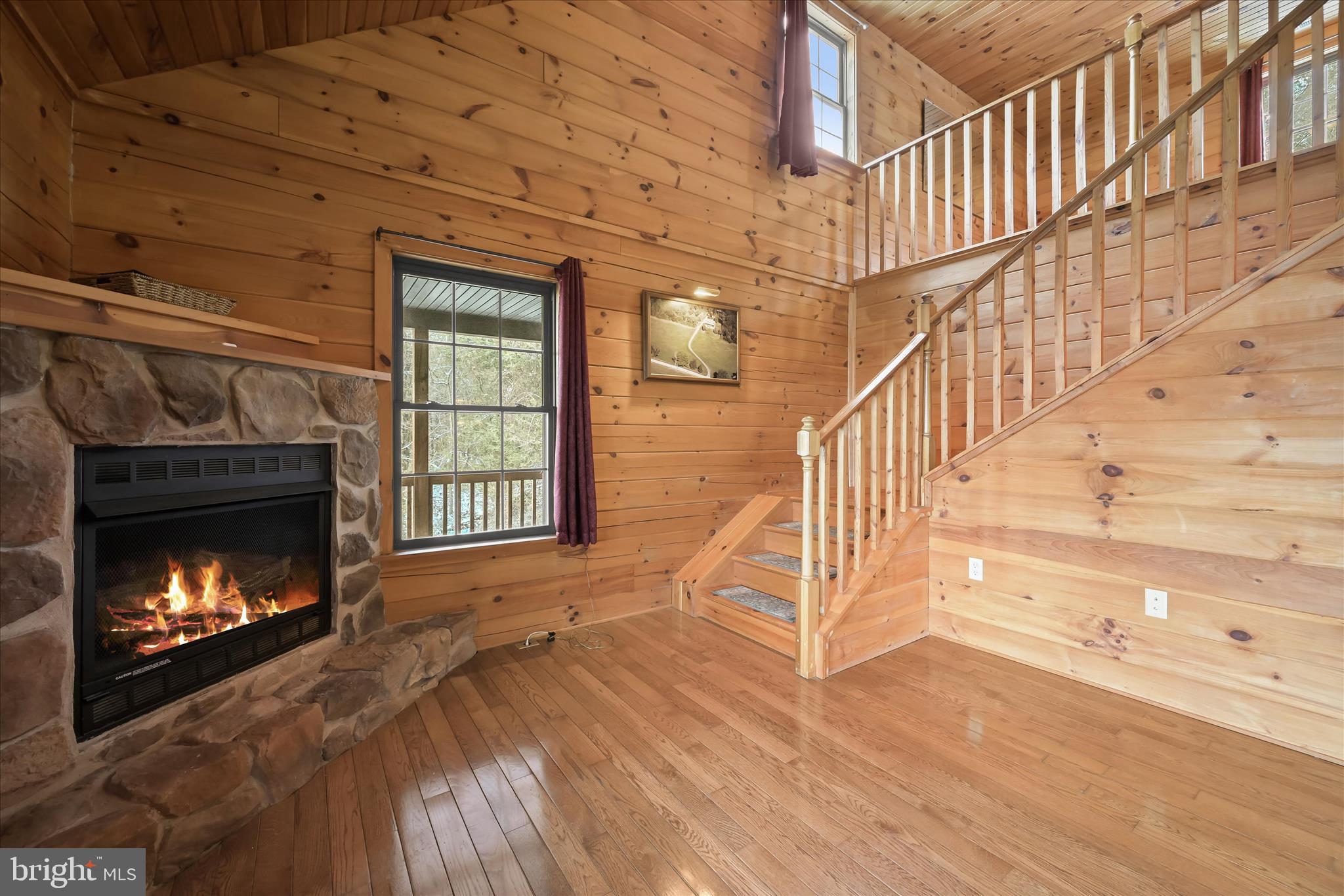 3580 Flickinger Road Westminster, MD 21158 - Photo 9 of 81 a view of an entryway with wooden floor fireplace and a window