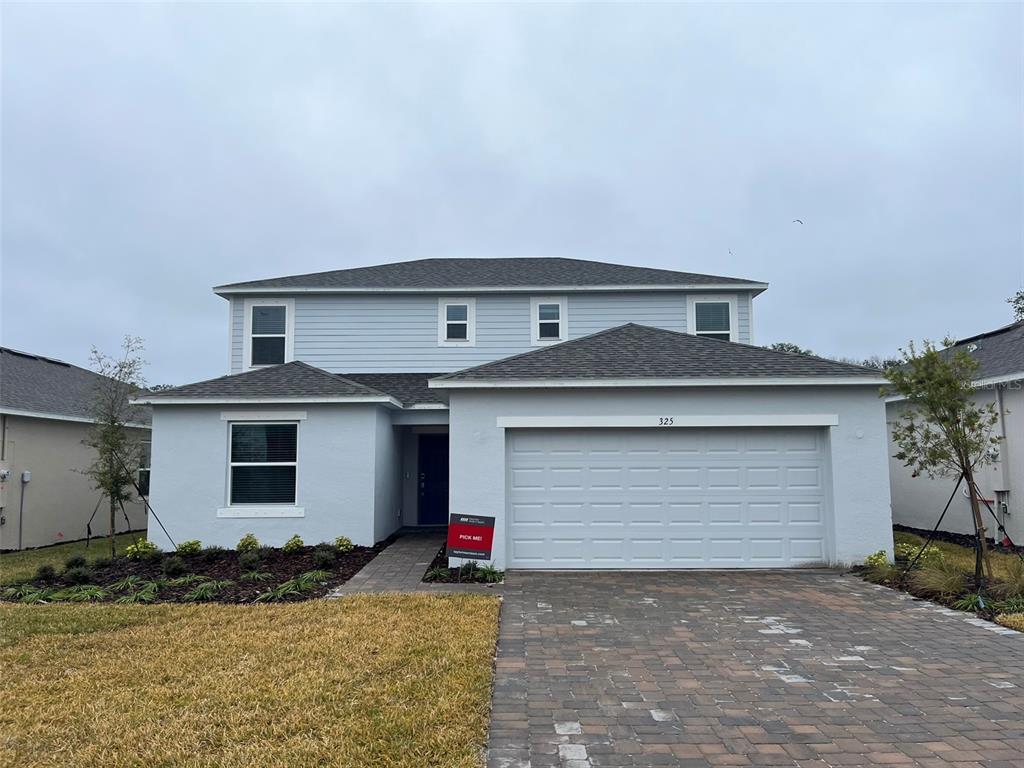 325 Riverfront Way Edgewater, FL 32141 - Photo 1 of 1 a front view of house with yard