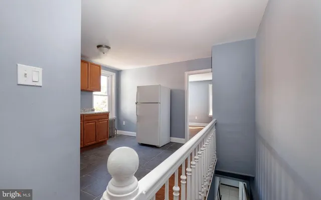 a room with furniture and window