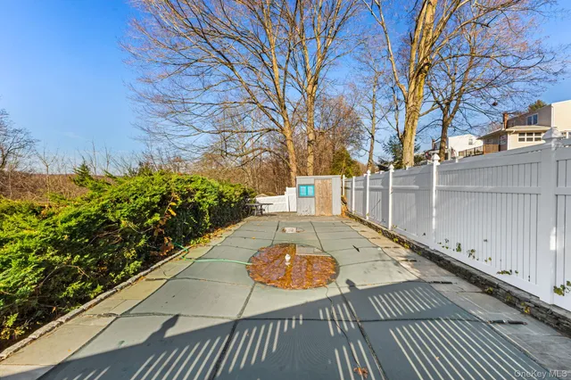 a view of a backyard with wooden floor