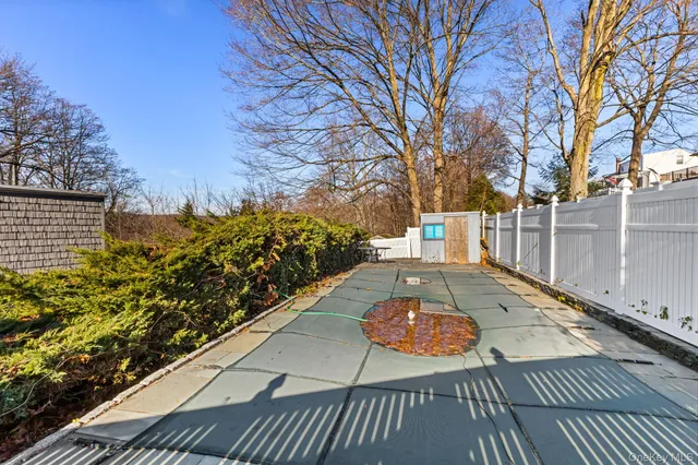a view of a patio with wooden floor