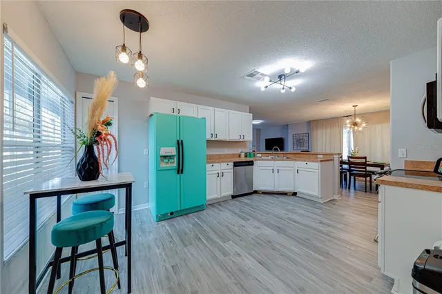 a bedroom with a bed and a view of bathroom