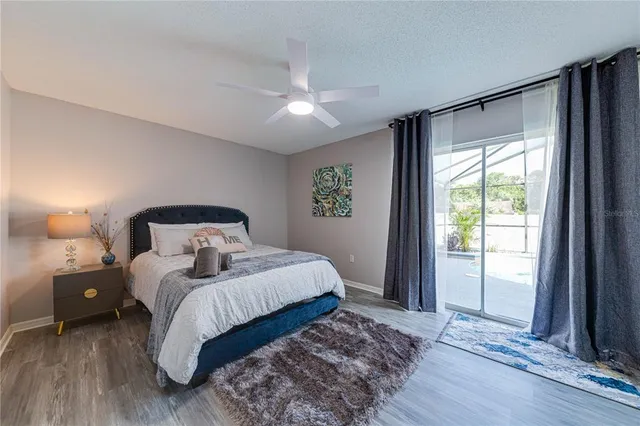 a utility room with cabinets washer and dryer