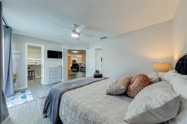 a bathroom with a bathtub a double vanity sink and a