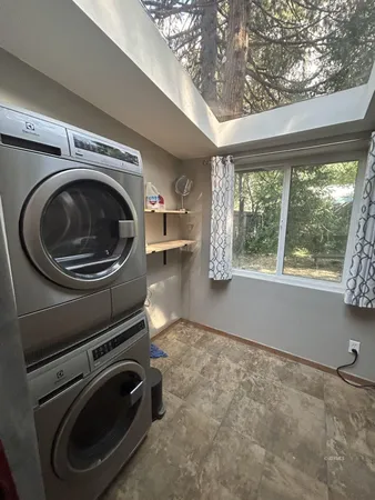 a view of room with window and outdoor space