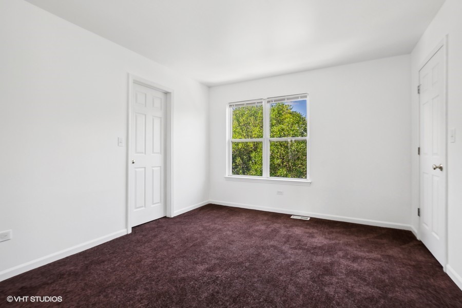 39 East 89th Street Chicago, IL 60619 - Photo 12 of 21 an empty room with a window
