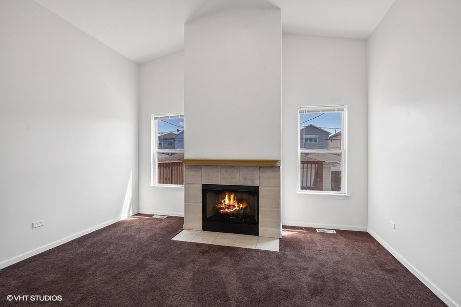 39 East 89th Street Chicago, IL 60619 - Photo 9 of 21 a room with a fireplace
