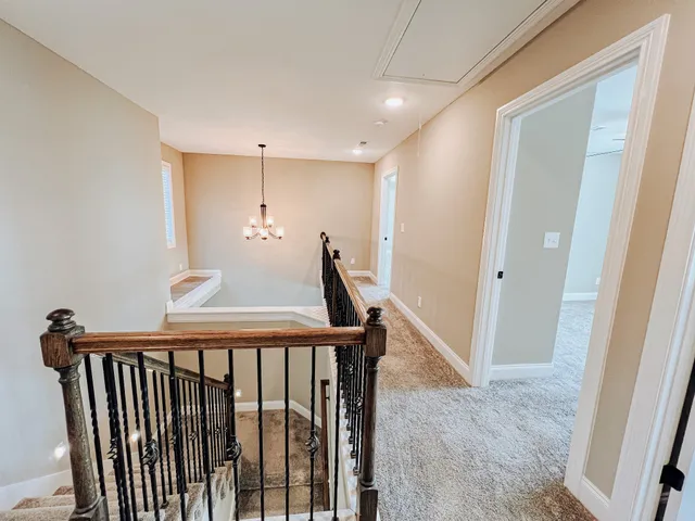 a view of hallway with stairs