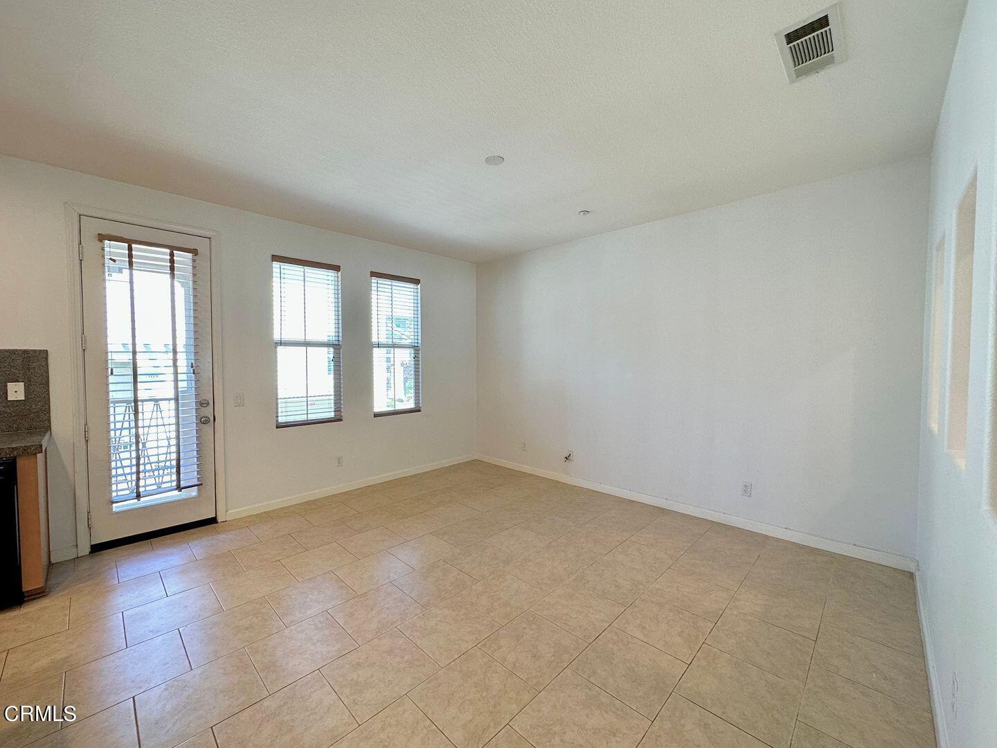 1202 Bayside Circle Oxnard, CA 93035 - Photo 18 of 48 an empty room with windows