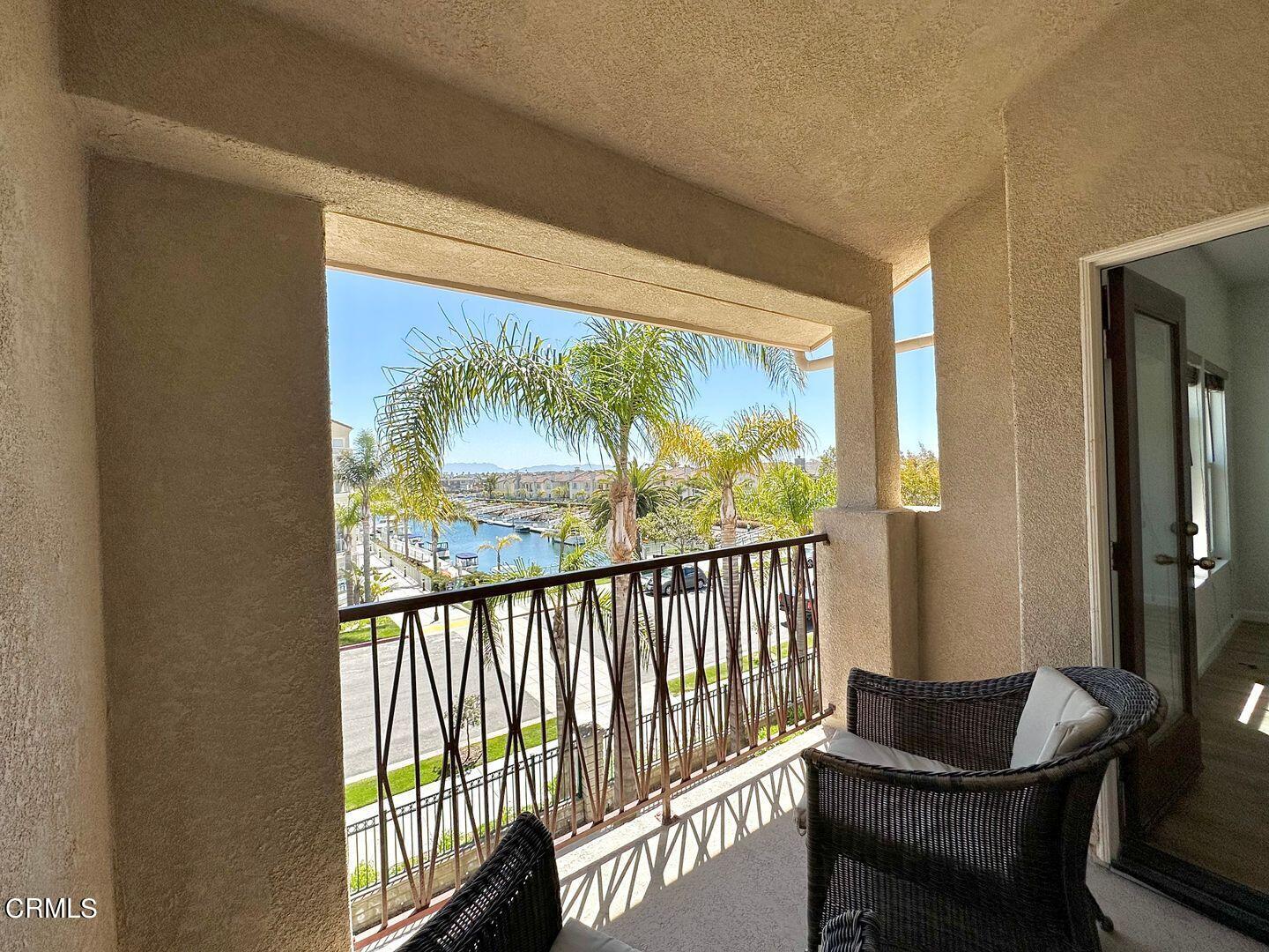 1202 Bayside Circle Oxnard, CA 93035 - Photo 33 of 48 a view of a porch with furniture