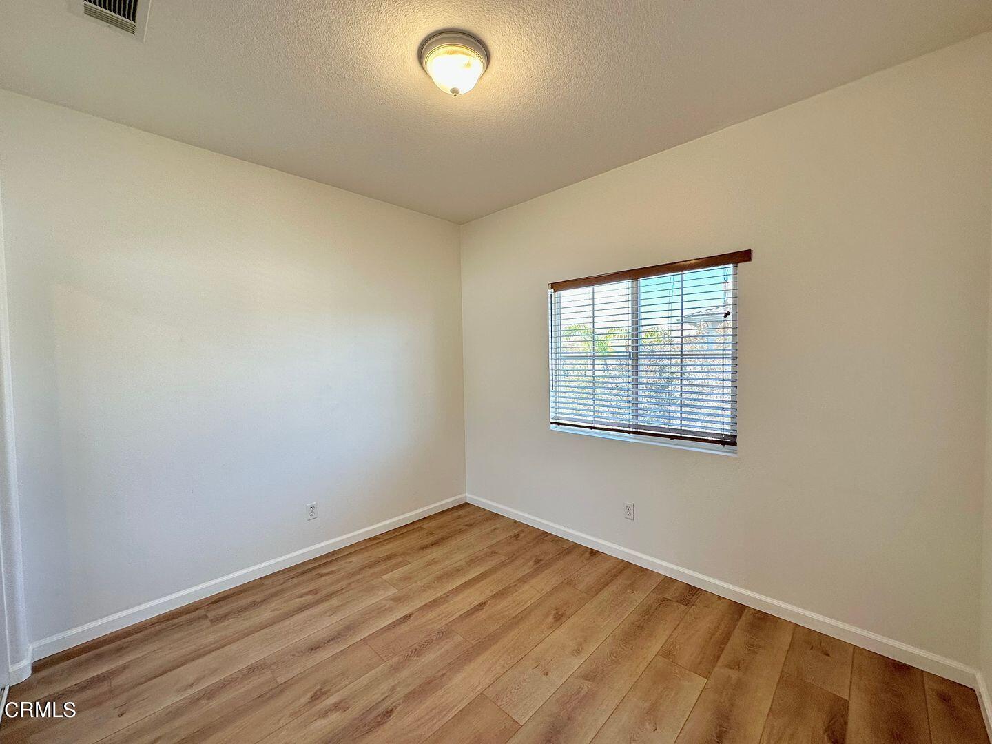 1202 Bayside Circle Oxnard, CA 93035 - Photo 39 of 48 an empty room with a window