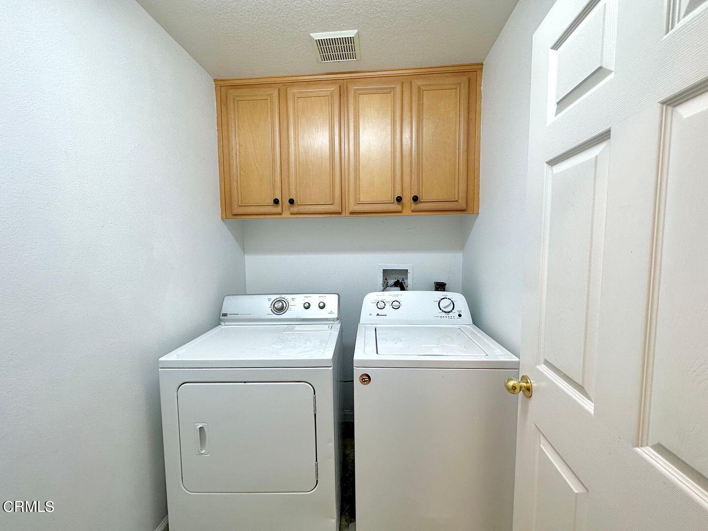 1202 Bayside Circle Oxnard, CA 93035 - Photo 41 of 48 a utility room with dryer and washer