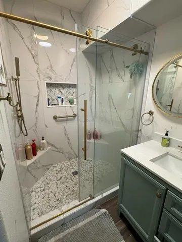 a bathroom with a sink and a mirror