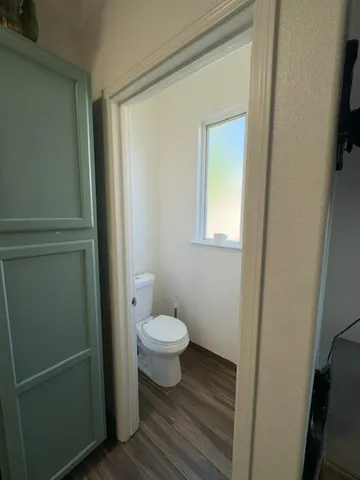 a bathroom with a toilet