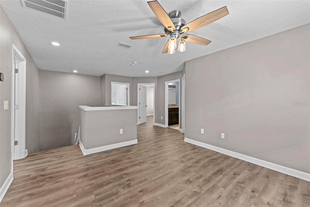 1040 Oliveto Verdi Court Brandon, FL 33511 - Photo 14 of 35 a view of an empty room with a window