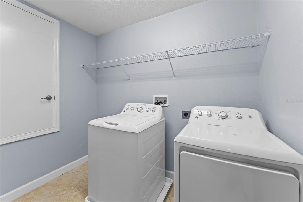 1040 Oliveto Verdi Court Brandon, FL 33511 - Photo 27 of 35 a utility room with dryer and washer