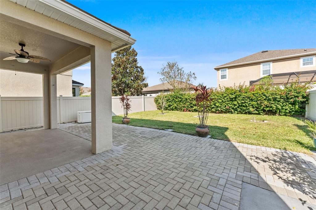 1040 Oliveto Verdi Court Brandon, FL 33511 - Photo 28 of 35 a view of backyard of the house