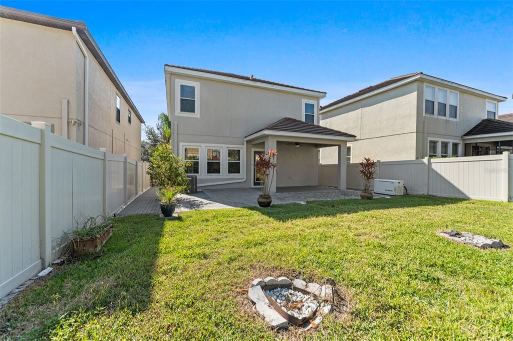 1040 Oliveto Verdi Court Brandon, FL 33511 - Photo 29 of 35 a front view of a house with garden