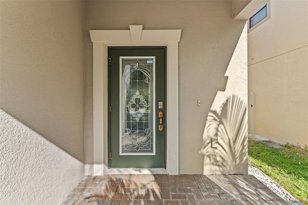 1040 Oliveto Verdi Court Brandon, FL 33511 - Photo 9 of 35 a bedroom with a bed and a window