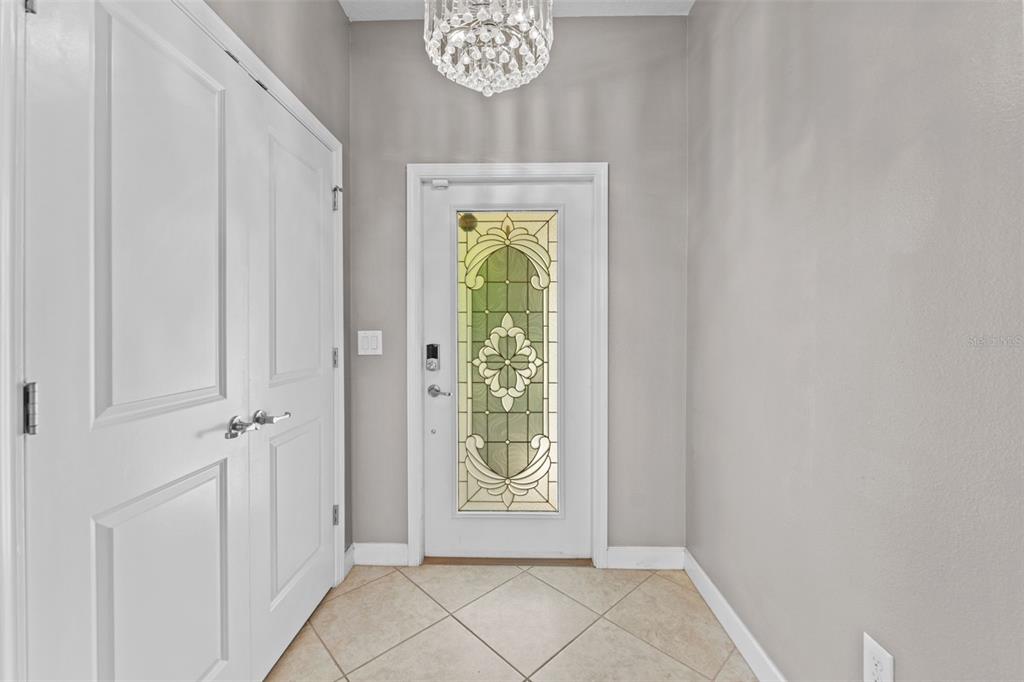 1040 Oliveto Verdi Court Brandon, FL 33511 - Photo 10 of 35 a view of front door with wooden floor