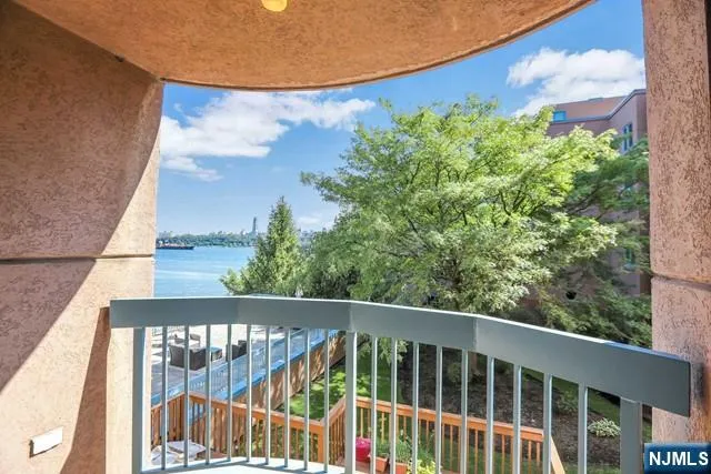 a view of a balcony with chair