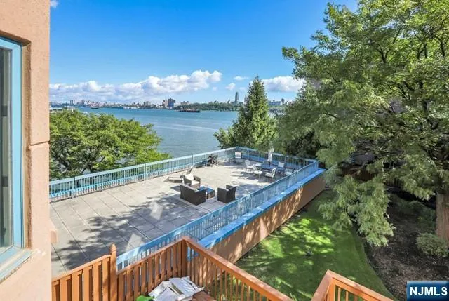 a view of a balcony with lake view
