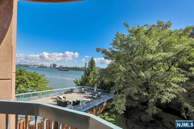 a view of a lake from a balcony