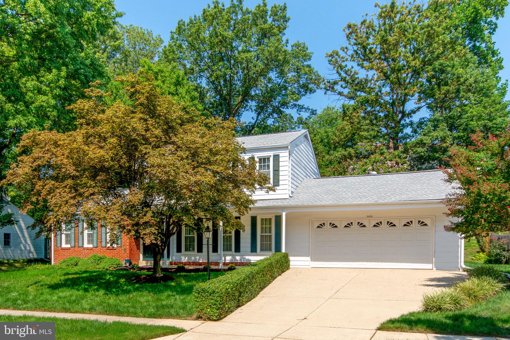 8404 Margo Road Lanham, MD 20706 - Photo 1 of 32 Front of Home showing the over-sized 2 car garage